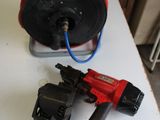 a picture of a red and black cordless nailer and a black and red cordless nailer