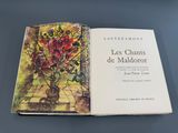 a book with a picture of a vase of flowers on it