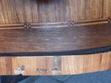 a close up of a piece of wood on a table