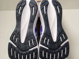 the soles of a pair of running shoes on a table