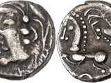 a close up of a coin with an image of a man on it