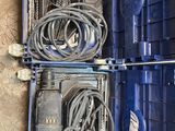 two blue boxes with wires in them on the floor