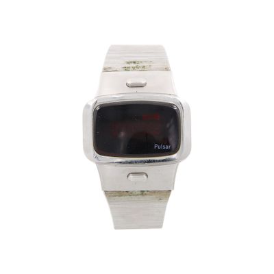a white watch with a black face on a white background