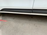 a close up of a car with a black and white stripe on the side of it