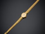 une montre-bracelet en or 18 carats, signée Cartier