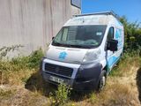 a van that is parked on the side of the road