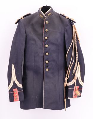 a blue military jacket with gold buttons and a white collar