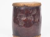 an image of a brown and black container with a horse design on it