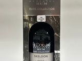 une photo d'une bouteille de rhum El Dorado dans une boîte