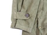 a close up of a jacket with buttons on it
