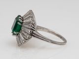 an emerald and diamond ring