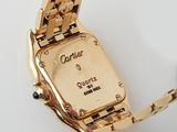 cartier, a lady ' s 18k gold quartz wrist watch
