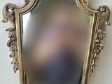 a mirror that is sitting on a table