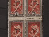 quatre timbres sur lesquels figurent une femme et un homme