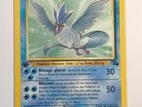 the pokemon card is displayed on the wall of the room