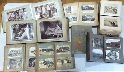 a lot of old photos on the table