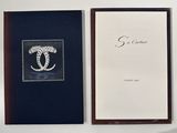 a picture of a picture of a brooch and a picture of a letter c