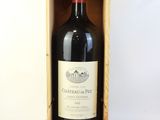 a bottle of red wine in a wooden box