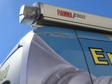 a close up of an emergency vehicle with its lights on