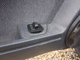 a close up of a car door handle on a car