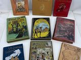 six children ' s books are lined up on a white surface