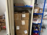 a storage area with boxes and boxes on the shelves