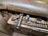 an old machine that is sitting on the floor