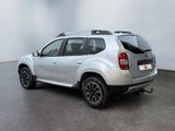 a picture of the rear end of a silver dacia