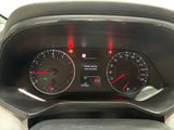 a close up of a car dashboard with a speedometer and gauges