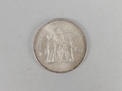 an image of a coin on a white surface