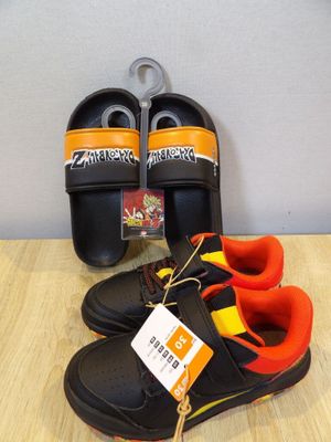 a pair of shoes and a pair of sandals on a table