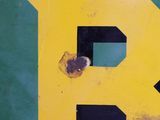 a close up of the letter b painted on the side of a building