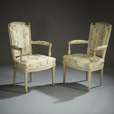 pair of louis xvi style armchairs with floral upholstered arms