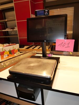 a laptop computer sitting on top of a desk