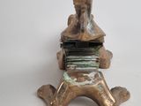 a metal object that is sitting on top of a table