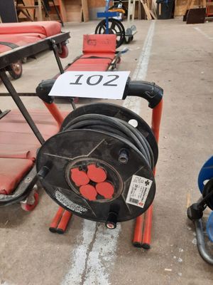 many different types of hoses on display in a warehouse