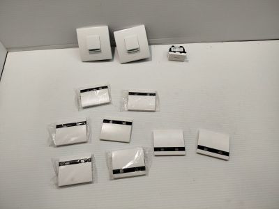 a lot of white switches on a white surface