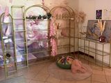 a picture of a room with a lot of flowers on the wall