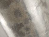 a close up view of a cat ' s face through a plastic bag
