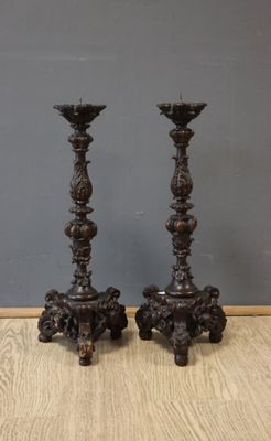 paire de chandeliers anciens en fonte