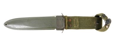 a knife that is laying on top of a piece of cloth