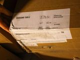 a person holding a box that has a receipt in it