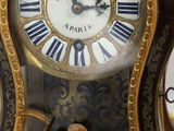 a clock that is sitting on top of a table