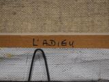 an image of a close up of a piece of art with writing on it