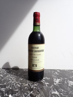 a bottle of wine that is sitting on a table