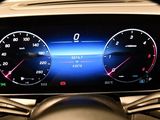 the dashboard of a car with a digital display on it