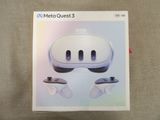 packaging for a nintendo wii game console with a metal quest 5 controller