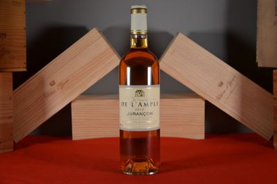 a bottle of wine that is sitting on a table
