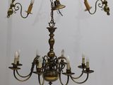 an image of a chandelier with five lights hanging from the ceiling