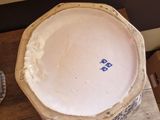 a large bowl sitting on top of a wooden table